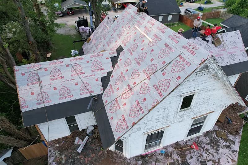 Aerial view of a Southern Indiana home with a brown shingle roof